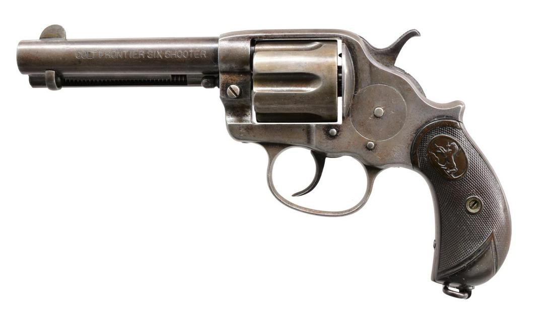 MODEL 1878 DOUBLE ACTION "COLT FRONTIER SIX: SHOOTER". Cal. 44-40. S# 28055. Standard configuration. Bbl. 4 3/4". 2 Line Hartford address, black medallion composition grips & lanyard ring, stamped "COLT FRONTIER SIX SHOOTER" on left side. Manufa