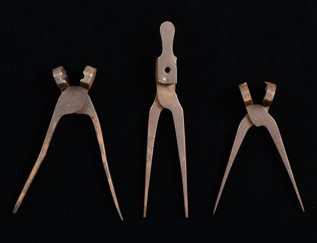 LOT OF 3 UNUSUAL 2 OR 3 RING POSSIBLE CONFEDERATE: USED RIFLE MINIE MOLDS. None of these 3 iron molds have any discernable markings. 1 Is similar to Hanoverian bullet in 58 cal. 1 Has sprue cutter in approx. 58 cal. CONDITION: mold w/ sprue cutter is 