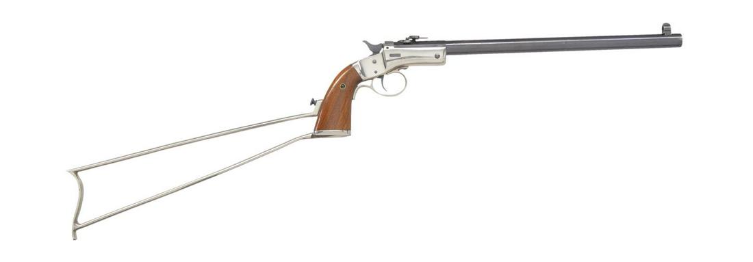 STEVENS NEW MODEL NO. 40 POCKET RIFLE.: Cal. 22 RF. S# 22343. Bbl. 12" rnd. w/ oct. shank. Combination globe front sight & adj. combination folding leaf rear sight. Blue finish bbl. w/ nickel finished action. Action features cast iron trigg