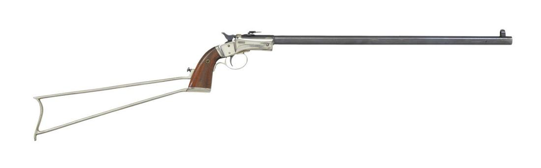 STEVENS NEW MODEL NO. 40 POCKET RIFLE.: Cal. 32 RF. S# 37432. Bbl. 17 7/8" rnd. w/ oct. shank. Combination globe front w/ combination folding leaf peep rear sight. Blue finished bbl. Nickel finished action & stock. Features include mushroom