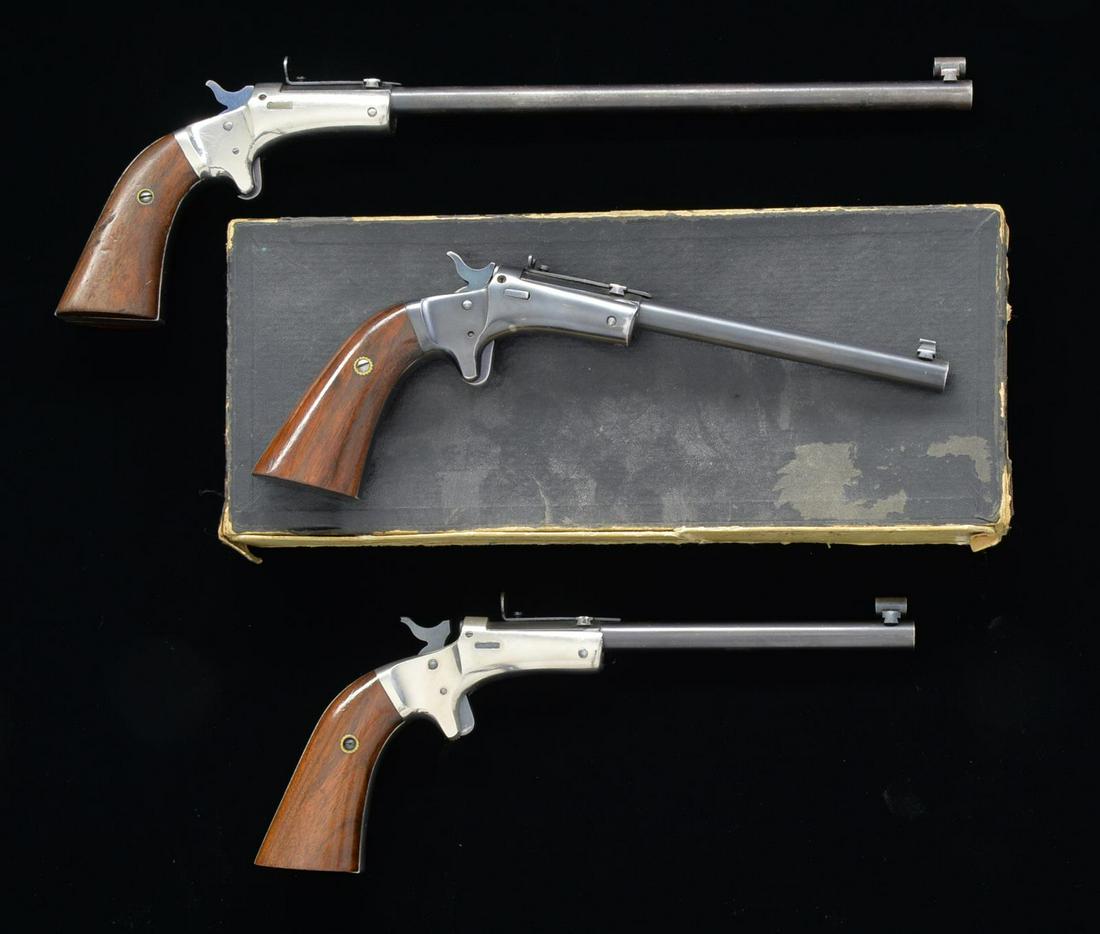 3 STEVENS DIAMOND NO. 43 SECOND ISSUE TIP UP: PISTOLS. ALL: cal. 22 RF. Iron frames w/out sideplates. Features include spur triggers, linkage operated extractors, frame mounted firing pins & 2 piece walnut grips. Estimated quantity 70,000, 1896-1
