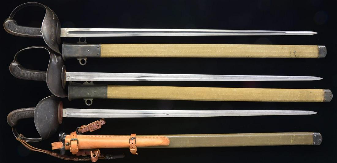 3 M1913 CAVALRY SWORDS.: The model 1913 cavalry sword was designed by General George S. Patton & is commonly referred to as the “Patton sword”. It represents a technological leap forward concentrating on the thrusting pow