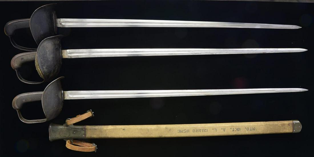 3 M1913 CAVALRY SWORDS & 1 SCABBARD.: The model 1913 cavalry sword was designed by General George S. Patton & is commonly referred to as the “Patton sword”. It represents a technological leap forward concentrating on the thrusting pow