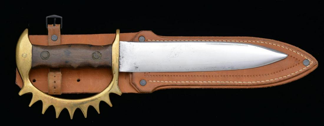 EXTREMELY RARE 1st MODEL 1943 “HOWARD COLE”: 9-POINT KNUCKLE KNIFE. This exact knife is described and pictured in Bill Walter’s “U.S. AND ALLIED MILITARY KNIVES WORLD WAR II” pages 30-32. The late M. Howard Cole is best known for his 5 boo
