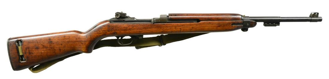 US WINCHESTER M1 CARBINE.: Cal. 30 Carb. S# 1058012. Bbl. 18", marked behind front sight “W”. Winchester mfg. M1 Carbine. Milled adj. rear sight marked “FI”. Blade front sight w/ protective ears. Bbl. band w/ bayonet lu