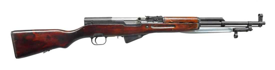 ATTRACTIVE RUSSIAN SKS 45 IMPORTED BY KBI: INDUSTRIES. Cal. 7.62x39. S# RH205259. Bbl. 20 1/2". This beautiful example of the Russian SKS imported by KBI has a dark mid-gloss wooden stock w/ numbers matching it & the receiver, trigger group, b