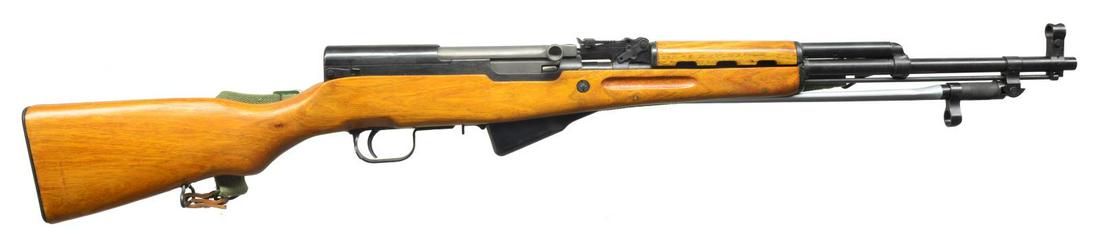 2 MILITARY STYLE SEMI AUTO RIFLES.: 1) CHINESE SKS. Cal. 7.62x39. S# C11 9137147. Bbl. 20.5". Desirable Chinese SKS imported by GLNIC in Los Angeles, CA. Proper spike folding bayonet complete w/ green canvas sling. Cleaning rod mounted 