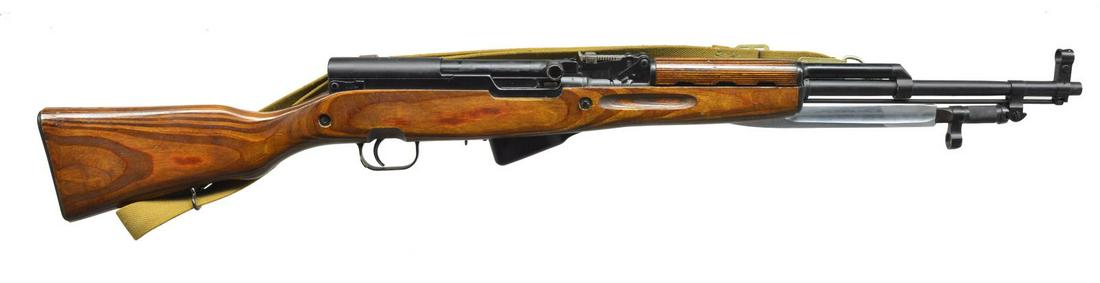 RUSSIAN SKS CARBINE.: Cal. 7.62x39. S# BM3751. Bbl. 20 7/8". All visible number match. Import marked on bottom right bbl. Receiver marked on right side w/ "V M" & "B M" & S#. Receiver cover marked on top w/ arrow & five po