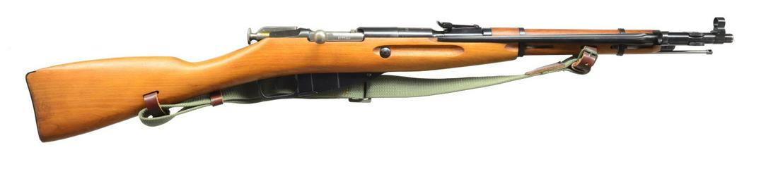 FOUR M44 BOLT ACTION CARBINES WITH FOLDING SPIKE: BAYONETS. ALL: bbls. 20 1/4". 1) POLISH M44. Cal. 7.62x54R. S# BD14463. All visible numbers match. Straight bolt handle. Round receiver unmarked. Bbl. marked over chamber w/ "11" in oval & "1952". Tan