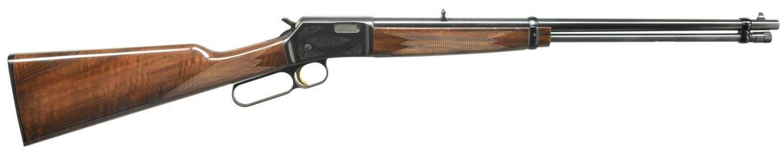 BROWNING BL 22 GRADE II LEVER ACTION RIFLE.: Cal. 22 LR. S# 72B72815. Bbl. 20" rnd. w/ bead front sight & folding leaf rear sight. Tubular mag. Action features a short throw lever, gold finished trigger, scroll engraving & tip off scope grooves.