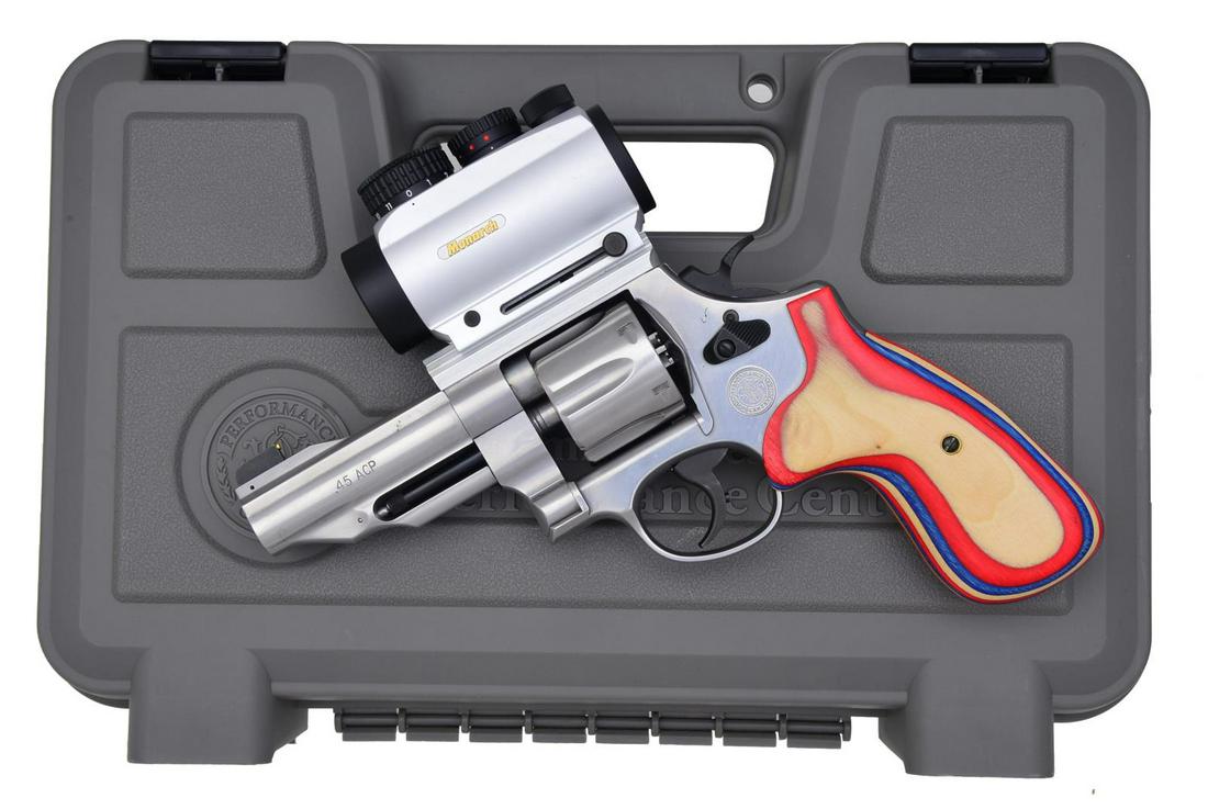 SMITH & WESSON 625-8 PERFORMANCE CENTER DA: REVOLVER. Cal. 45 ACP. S# CSN1183. Bbl. 4" w/ rib & shrouded ejector rod. McGivern gold bead front sight. Nikon Monarch optical sight. 6 Shot fluted cyl. Right side of bbl. is marked "PERFORMANCE CENT