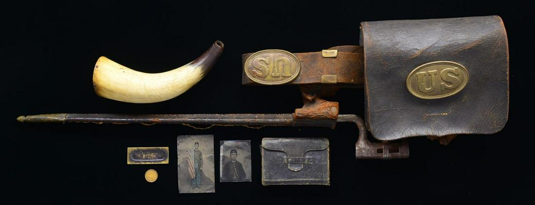 IDENTIFIED LEWELLYN LIBBY 23RD MAINE INFANTRY: ACCOUTREMENTS & PHOTOGRAPHS. This sm. archive has cartridge box w/ Bangor ME contractor w/ enlisted belt & buckle & Springfield bayonet & scabbard attached. There is a sm. pocket diary inscribed “LE