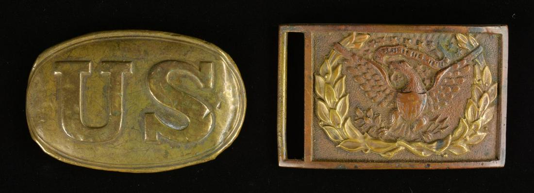 TWO CIVIL WAR BELT BUCKLES AND FOUR CANTEENS.: 1) Model 1850 enlisted Cavalryman’s sword belt plate w/ 3 piece applied German silver wreath. CONDITION: very good overall w/ light chocolate patina. 2) Enlisted infantryman’s belt buckle, lead fi