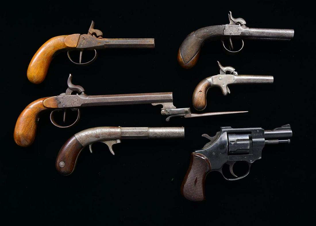 5 ANTIQUE PERCUSSION PISTOLS.: 1) UNMARKED SINGLE SHOT. Cal. 31. S# 27. Bbl. 2 1/8" w/ smooth bore. Iron frame w/ center mounted hammer & spur trigger. 2 Piece bag type walnut grips. CONDITION: cleaned gray metal showing spots of p