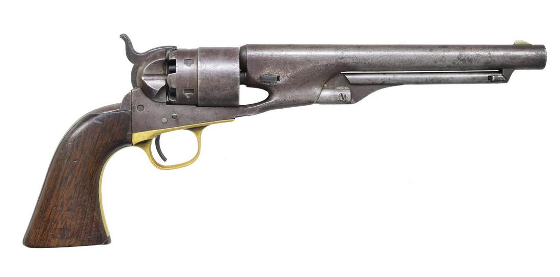 COLT 1860 ARMY US MARKED REVOLVER.: Cal. 44. S# 121133. Bbl. 8" rnd. w/ German silver blade front sight. 6 Shot roll engraved rnd. rebated cyl. Brass trigger guard. 1 Piece walnut grip w/ lightly visible cartouches on both sides. Bbl.,