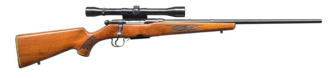 SAVAGE MODEL 340V RIFLE.: Cal. 225 Win. S# 235061. Bbl. 24" rnd. bbl. Front sight removed, holes filled w/ filler screws. Slot blank in rear dovetail sight. Left side of action has Weaver mount & rings, holding a Weaver 60-B s