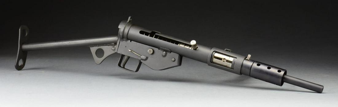 STEN MKII SMG ON WILSON TUBE.: Cal. 9mm. S# HF-813. Bbl. 8". Wilson Arms Sten MKII tube built on what is at least partially an Israeli marked kit. With a massive surplus of Sten parts kits, all w/ varying degrees of interchangeabil