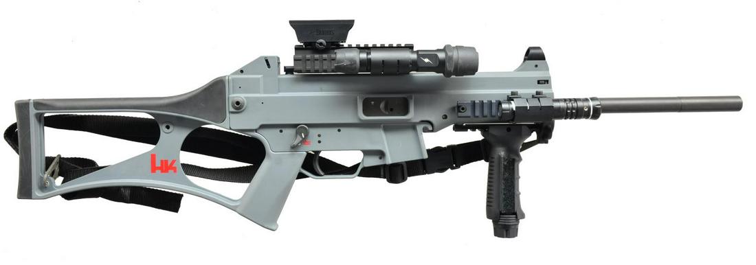 H&K USC 45 ACP CARBINE.: Cal. 45 ACP. S# 47-001525. Bbl. 16". The H&K USC (Universal Self Loading Carbine) is the civilian variant in semi auto only, rather than select fire, of the UMP (Universal Machine Pistol). This was he