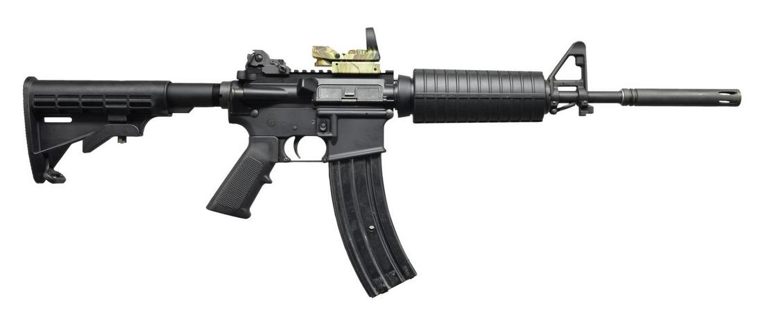 YHM COMMANDO STYLE CARBINE W/ PERMANENTLY ATTACHED: BRAKE. Cal. 223 Rem. S# YH2222. Bbl. 11 1/2" w/ permanently attached 5 1/2" muzzle brake. YHM carbine in an early commando configuration. Though it utilizes an 11 1/2" bbl. like the original, it has a