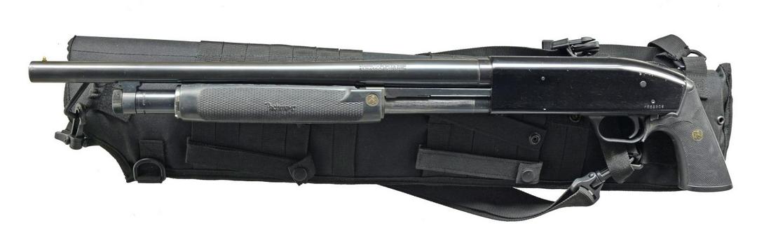 MOSSBERG 500A TACTICALLY EQUIPPED PUMP SHOTGUN.: Cal. 12 Ga., 2 3/4" & 3". S# K552809. Blued alloy action w/ sliding top mounted safety. Aftermarket Pachmayr checkered rubber pistol grip & rubber forend. (1) Bbl. 18 1/2" plain w/ cyl. bore & brass b