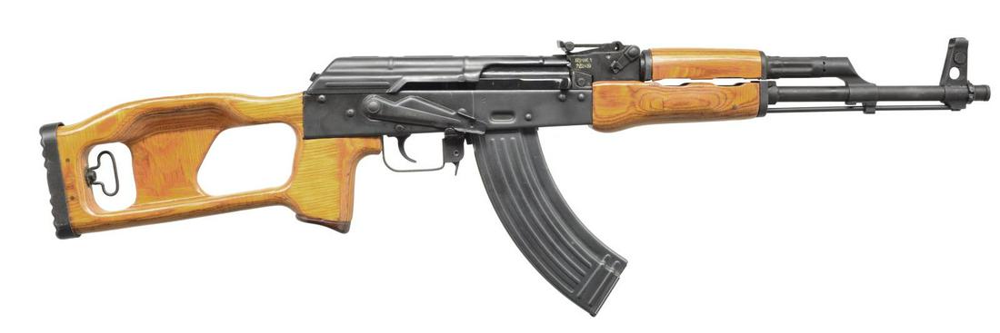 ROMANIAN THUMBHOLE ROMAK 1 RIFLE.: Cal. 7.62x39. S# 1-6649-97. Bbl. 16". A Romanian AK variant mfg. for the US civilian market in 1997. Bbl. is terminated w/ a threaded muzzle & spot welded thread protector. Earless bayonet lug still h