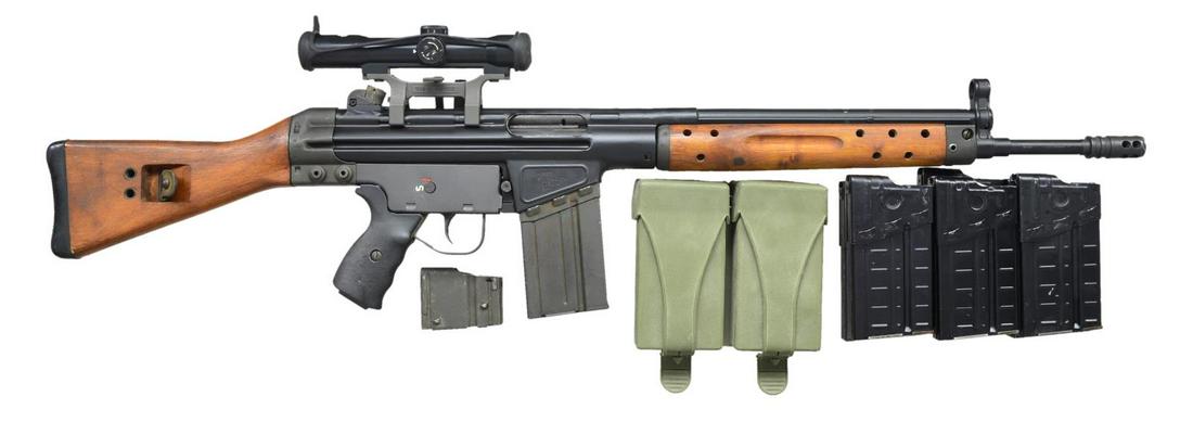 HESSE CETME H91 RIFLE W/ ILLUMINATED HENSOLDT: WETZLAR SCOPE. Cal. 7.62 MM. S# G004207. Bbl. 17 1/2". Cetme rifle built on a Hesse H91 receiver. C.A.I. import marked bbl. terminated w/ a threaded muzzle & Cetme style brake. Classic Cetme wooden fu