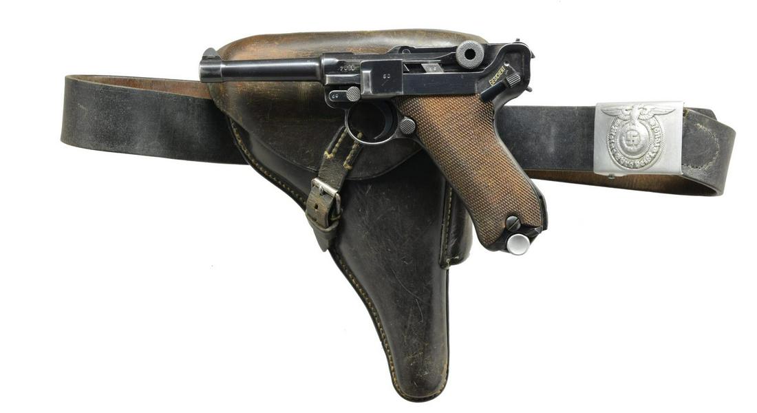 MAUSER S/42 CODE LUGER SEMI-AUTO PISTOL RIG.: Cal. 9mm Luger. S# 7056x. Bbl. 4". Mfg. 1937 w/ late finish for German military sales. Approx. 89,000 mfg. w/ proper all blue finish from S# 1501t to 400b. Toggle marked S/42. All matching #s to inclu