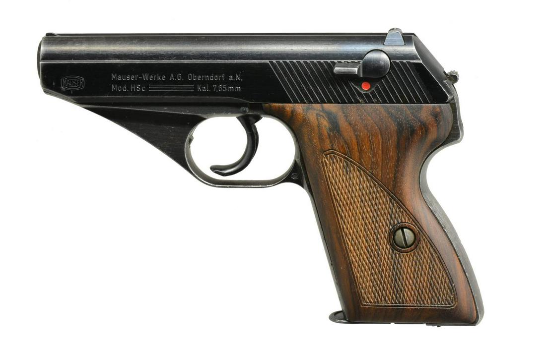 MAUSER MODEL HSc SEMI-AUTO PISTOL.: Cal. 7.65mm (32 ACP). S# 965648. Bbl. 3.4". Blued post war model mfg. under French supervision for their use w/ intertwined "RW" on left side of trigger guard. Dark walnut grips w/ checkering. MAGS: 1