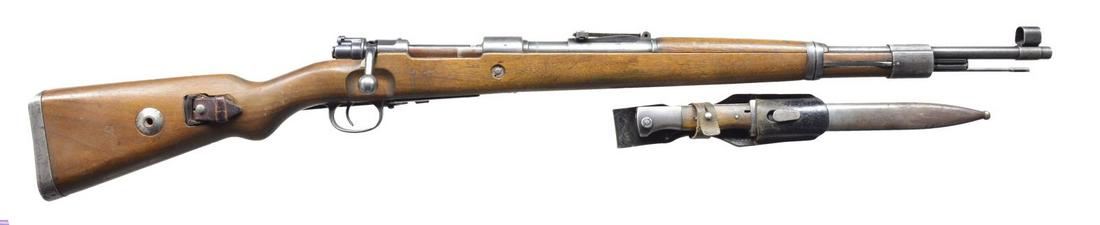 WWII MAUSER (BYF) 43 DATE BOLT ACTION RIFLE.: Cal. 8mm Mauser. S# 23226F. Bbl. 23 5/8". All visible numbers match. Receiver marked on left rail â€œMod. 98". Receiver ring marked on top w/ â€œbyf 43” & waffenamt 135. Left side of rec
