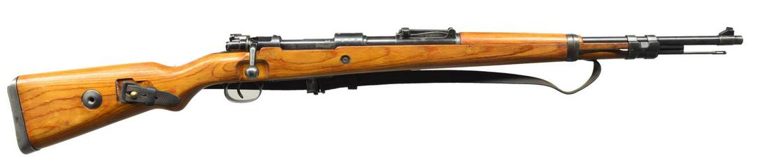 GERMAN WWII MAUSER (42) K98 BOLT ACTION RIFLE.: Cal. 8mm Mauser. S# 5779a. Bbl. 23 5/8". All visible numbers except upper band match. Markings are enhanced w/ white. Receiver marked on left rail w/ "Mod.98". Receiver ring marked on top w/ "42" indi