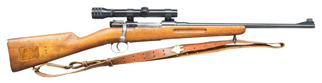 SPORTERIZED MODEL 96 CARL GUSTAF MAUSER RIFLE.: Cal. 6.5x55 (muzzle centerboard). S# HK109957. Bbl. 18 1/2", fitted w/ ramp front sight. 1896 type, small ring action has "Carl Gustaf" marked on receiver ring. Weaver scope bases have been fitted & b