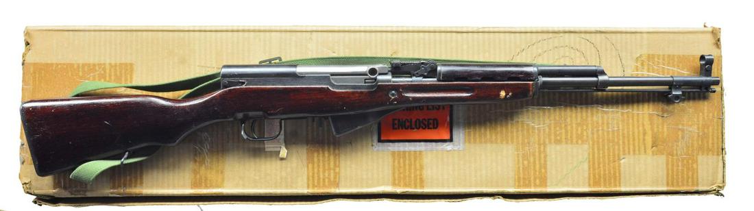 NORINCO SKS SEMI-AUTO CARBINE.: Cal. 7.62 x 39. S# 9013930. Bbl. 20 1/2". Import marked on left side of receiver. All visible numbers match. Tangent rear sight graduated to 1000m. Post front sight w/ protective hood. Cleaning rod is