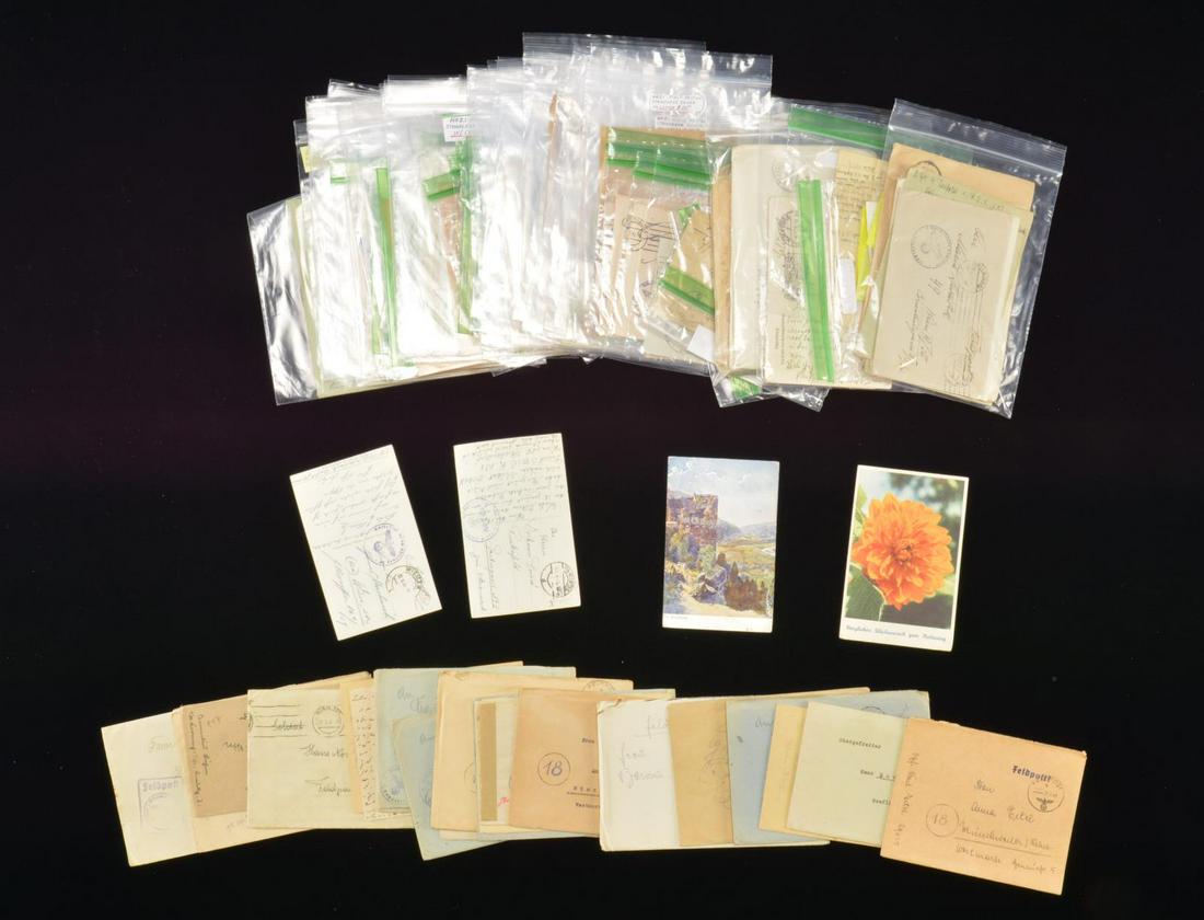 WWII GERMAN POSTAL EPHEMERA GROUP.: This lg. & interesting group consists of approx. 136 Feldpost ink stamped envelopes & cards, most bearing ink stamps w/ eagles & Party symbols. The majority of envelopes have contents & some are singl