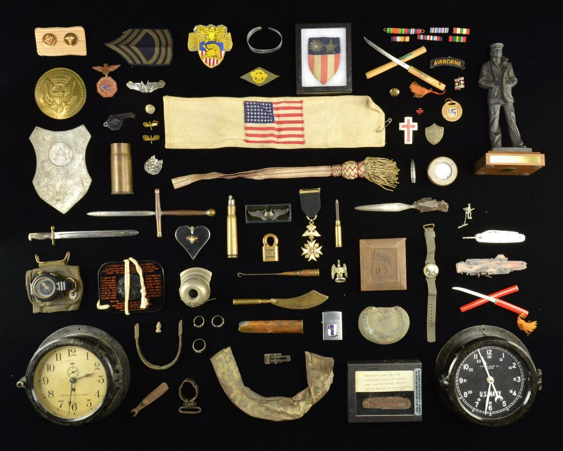 MOSTLY WWII ERA US MILITARY CLOCKS, INSIGNIA,: PATCHES, BADGES & ASSOCIATED ITEMS. This varied lot consists of 1 United States Marine Corps wall clock for ship or shore by Chelsea Clock Co., Boston. / 1 US Navy wall clock for ship or shore by Chel