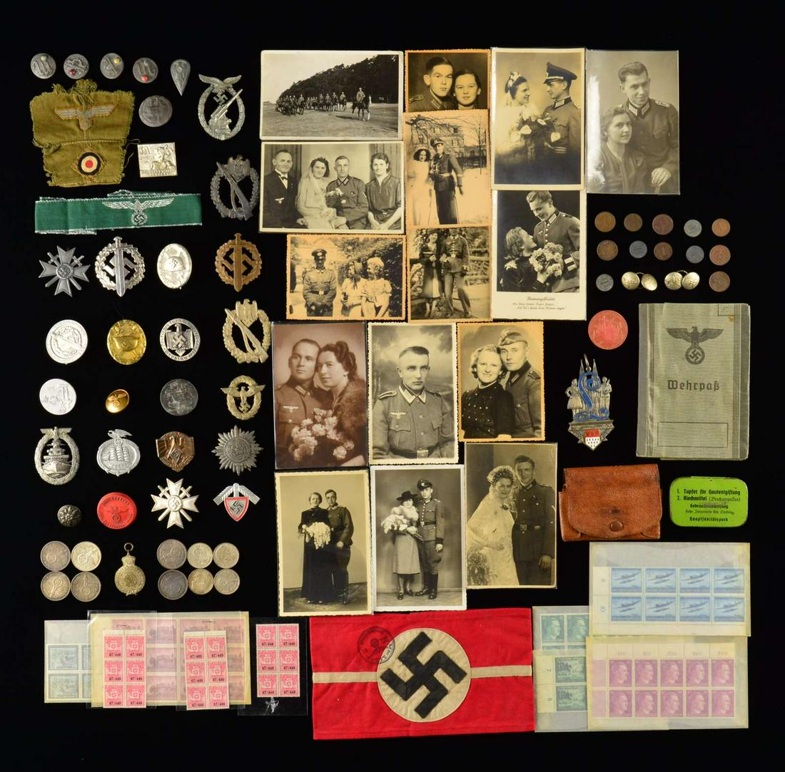 WWII GERMAN BADGES, PINS, CLOTH, COINS, TINNIES: & MORE. This varied group includes 1 Luftwaffe Flak badge. / 2 Infantry Assault badges. / 1 Customs cuff title. / 6 WHW pins. / The front section of an Afrika Korps M43 hat including insignia. / 1 Fir
