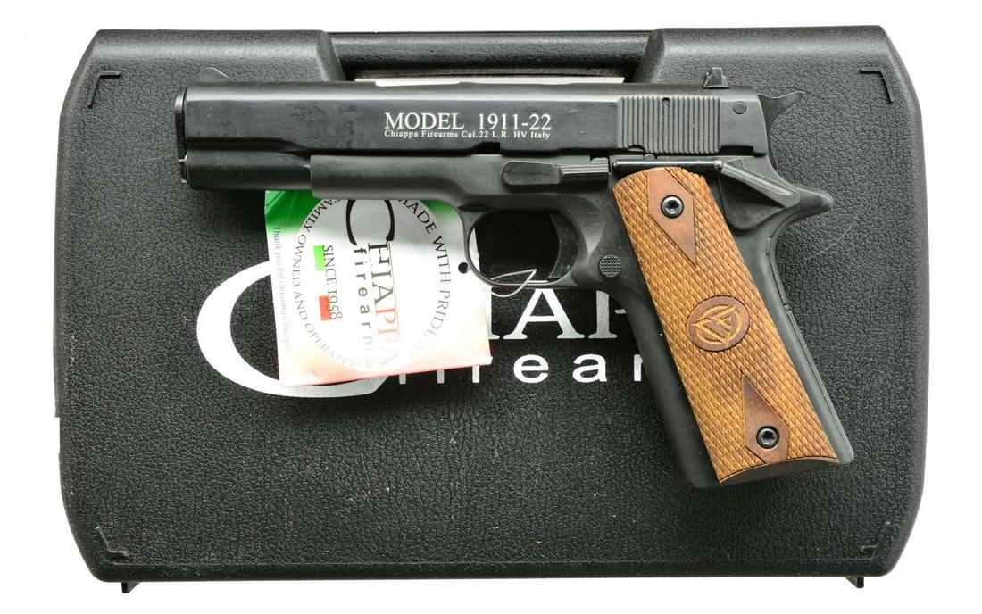 CHIAPPA 1911-22 SA SEMI AUTO PISTOL.: Cal. 22 LR. S# 19A03819. Bbl. 5". Matte black finished aluminum slide & frame. Combat sights. Key lock hammer block safety. Diamond checkered wood grips. MAGS: 2 polymer 10 rd. UNATTACHED ACCESSORIES: