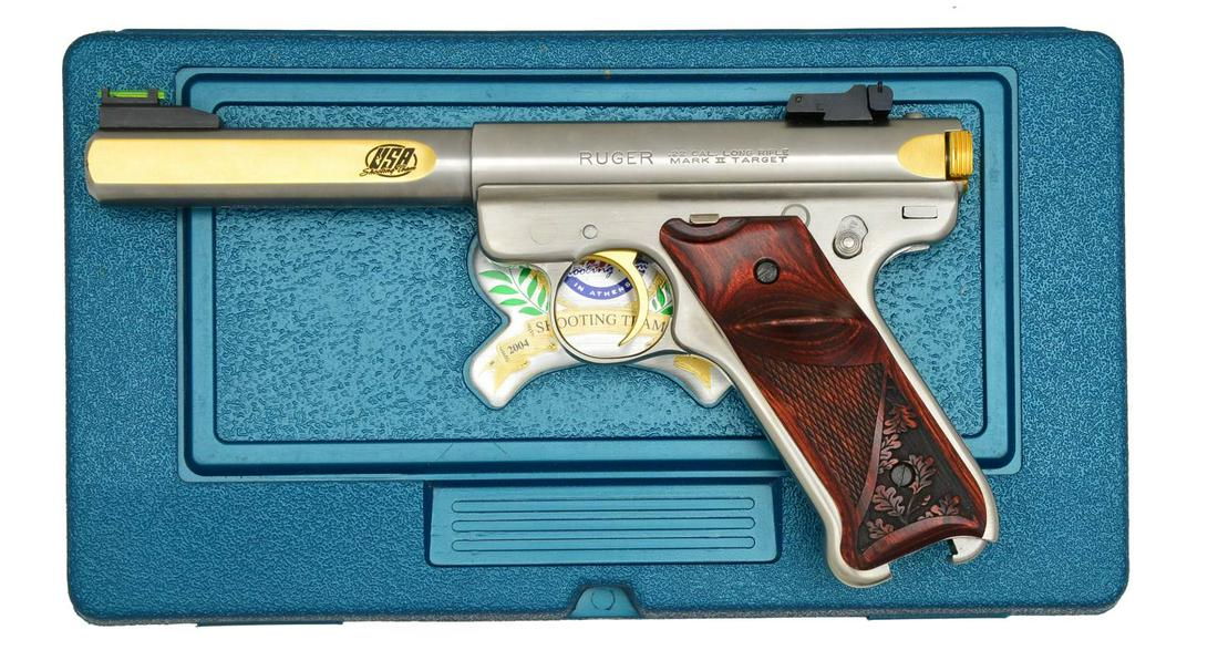 RUGER MKII USA SHOOTING TEAM BEIJING 2008 SEMI: AUTO PISTOL. COMPETITION TARGET. Cal. 22 LR. S# USA-00008. Bbl. 5 1/2" slab side w/ fiber optic screw attached front sight & adj. rear on receiver. Especially chosen S# 8 to coincide w/ 2008 Olympics.