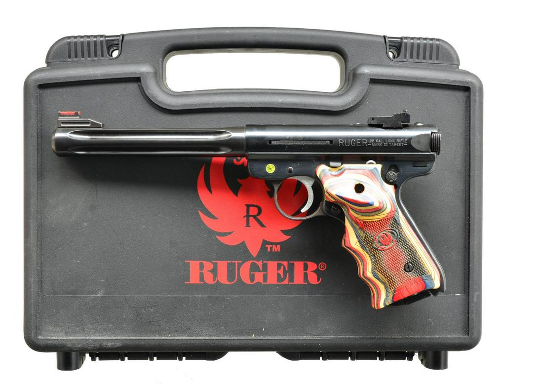RUGER MKIII HUNTER SEMI AUTO PISTOL, DISPLAYED AT: OLYMPIC CENTER. Cal. 22 LR. S# 229-61640. Bbl. 5 7/8" fluted bull w/ screw mounted fiber optic front sight & V notch frame mounted adj. rear having white vertical line on blade. Mfg. 2009 as Model 101