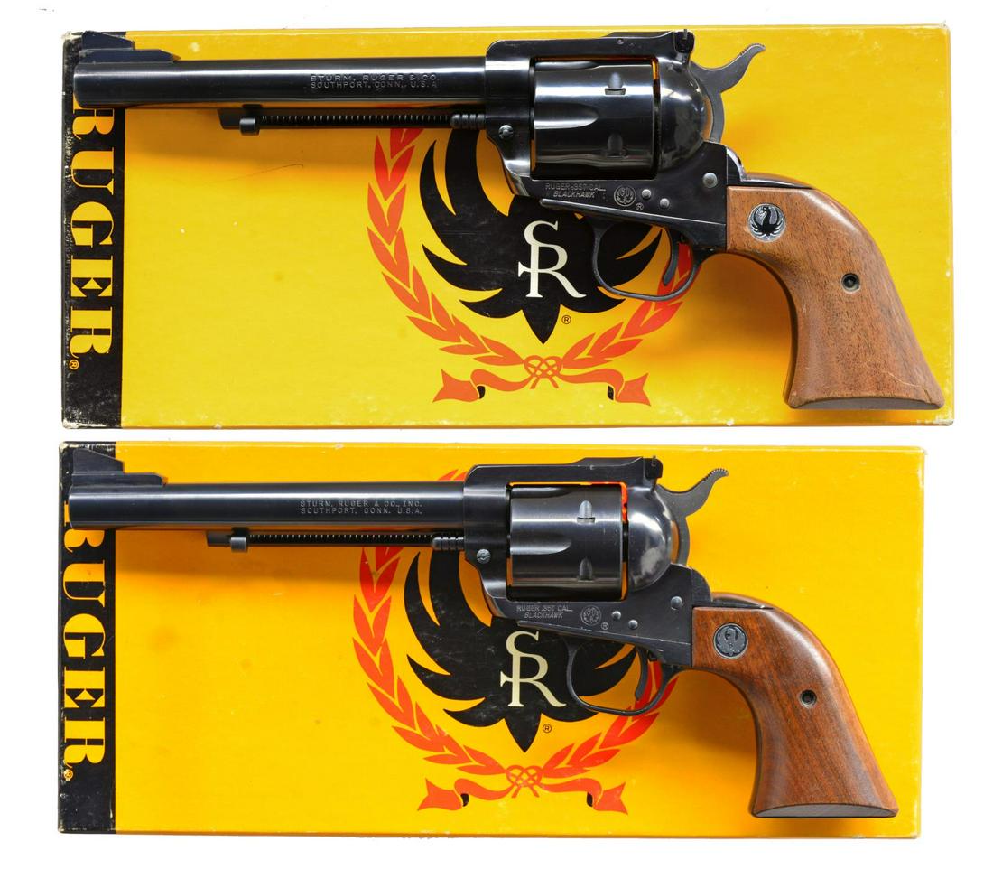 2 RUGER OLD MODEL BLACKHAWK REVOLVERS.: BOTH: bbls. 6 1/2" w/ ramp front sights & frame mounted adj. rears. Alloy ejector housings & original lock work w/out factory safety update. 1) Cal. 357 Mag. S# 56628. Mfg. 1964 as Ruger model BKH36 w