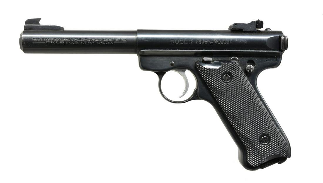 RUGER MARK II TARGET SEMI AUTO PISTOL.: Cal. 22 LR. S# 19-89238. Bbl. 5 1/2" bull w/ undercut target front sight & receiver mounted adj. rear. Mfg. 1984 as blued MK-512. Checkered black plastic grips w/ silver eagle medallion. MAGS: 1 facto