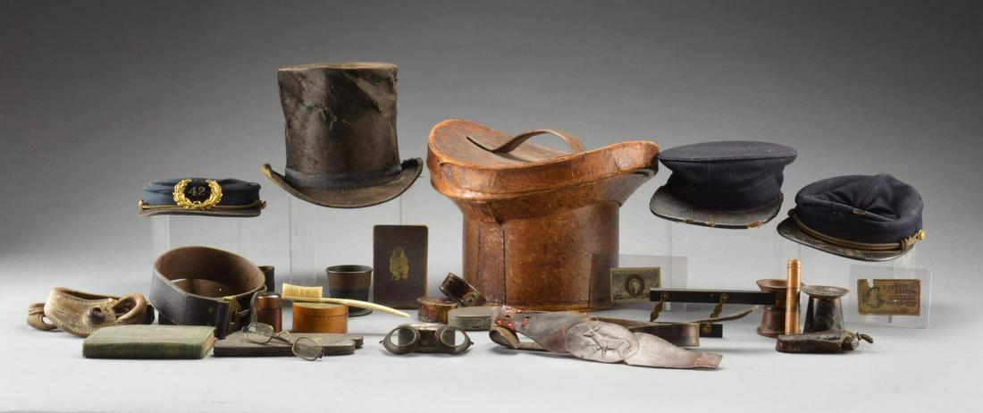 GROUP OF MOSTLY CIVIL WAR MILITARIA & RELATED: ITEMS. This group includes a pair of Lieutenant of Infantry shoulder straps from the late Civil War or Indian War w/ significant moth damage. / 1 Twist of Civil War era tobacco. / 7 Tin snuff boxes. /