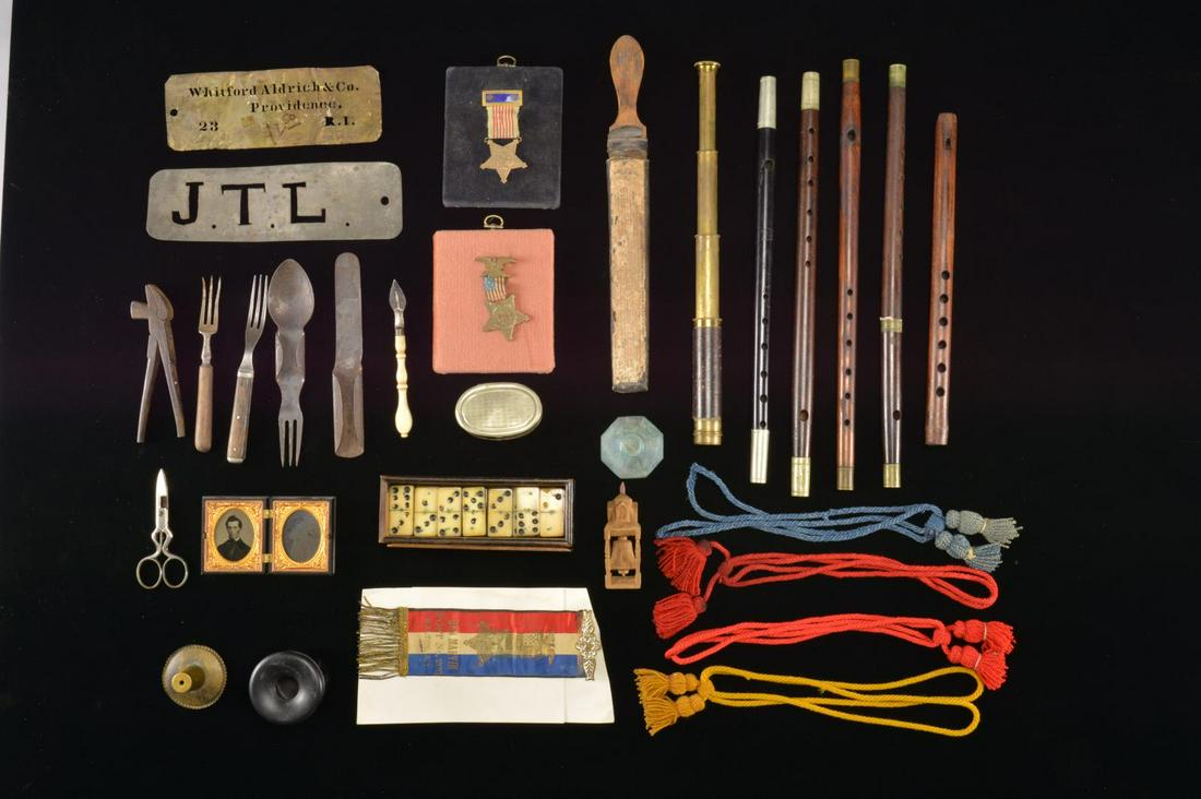 CIVIL WAR FIFES, STENCILS, DOMINOS, GAR BADGES: & MORE. This varied lot includes 3 Civil War era fifes w/ metal ferrules at each end. / 1 2 piece Civil War fife w/ a central metal ferrule. / 1 Carved wooden fife. / 1 Set of 28 bone dominoes in a wo