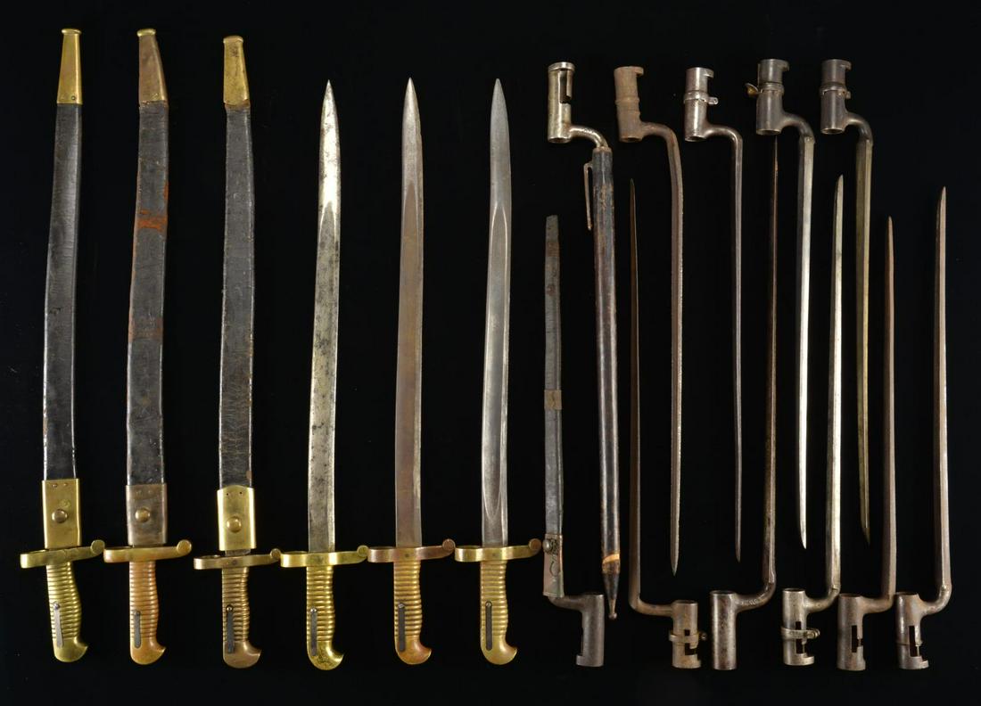 6 SABER BAYONETS & 11 SOCKET BAYONETS.: 1) Overall length: 25''. Blade length: 20 1/8". A US saber bayonet w/ a single fullered yataghan blade stamped â€œH” at the ricasso. Solid brass hilt stamped â€œS” under the muzzle