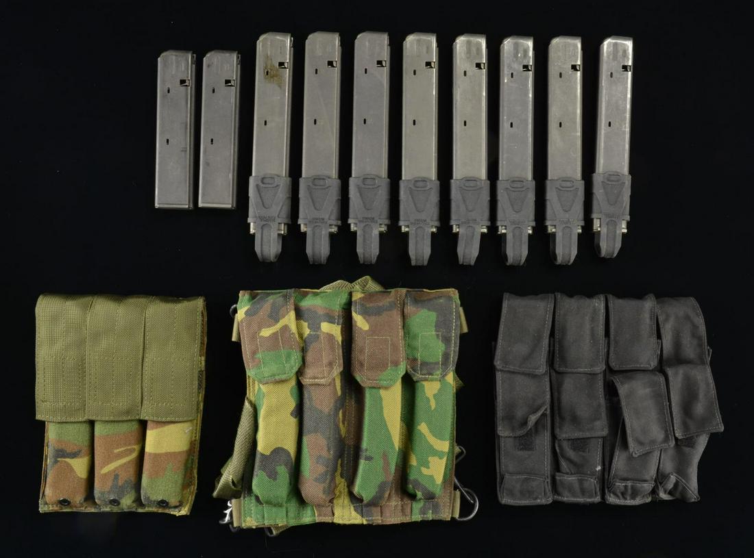 9MM H&K MP-5 PLUS COLT CARBINE MAGS.: 7 H&K 30 rd. MP-5 mags. in camo 3 mag. pouch plus 4 in mag. pouch w/ carry strap & belt. / 8 Colt 32 rd. Carbine mags. w/ Magpul rubber pull rings on bases plus 3 more w/out pull rings in black nylon