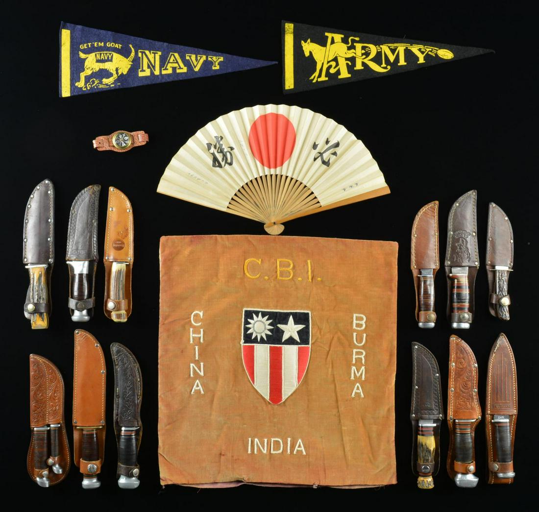 WONDERFUL COLLECTION OF EARLY WWII KNIVES & MORE.: This lot includes 1 green Army type blanket. / 1 WWII era guidon for the 67th Headquarters unit. / 1 Souvenir pennant for the Army. / 1 Souvenir pennant for the Navy. / 1 Brown Indian blanket of South