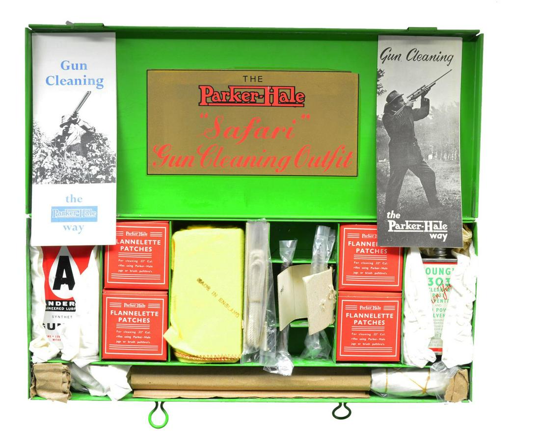 THE PARKER HALE SAFARI GUN CLEANING OUTFIT.: Complete gun cleaning kit contained in a 14 1/2" x 6" x 1 1/2" green metal box w/ Parker Hale label on inside lid. Kit consists of cleaning rod, nylon brush, brass brush, pull string, patch jag, Young