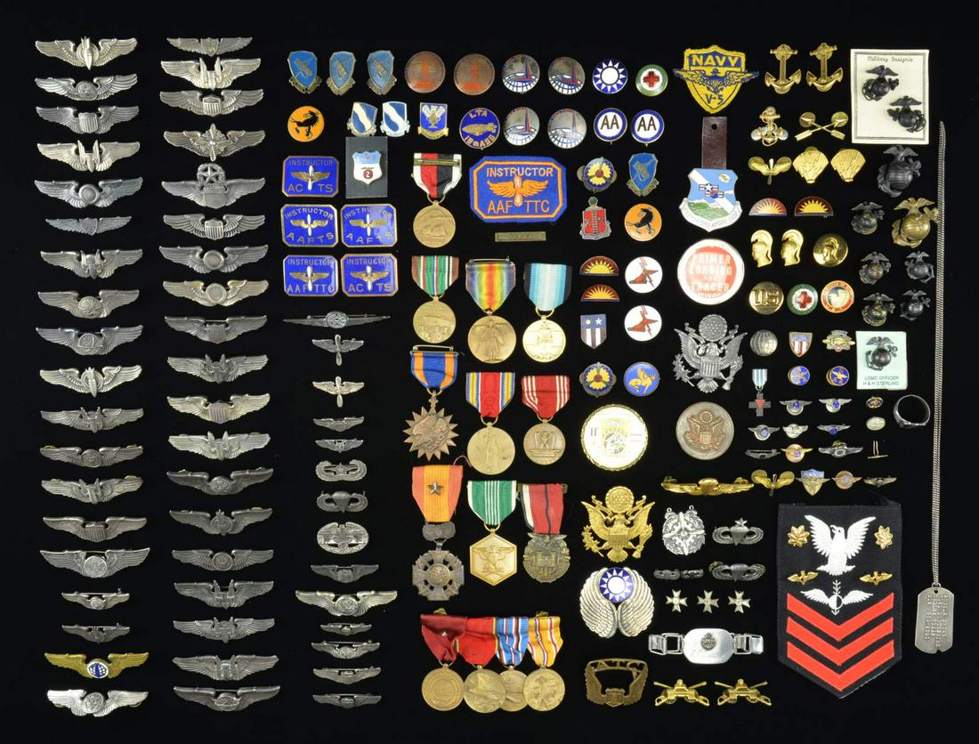 LARGE LOT OF WWII & LATER AIR CORPS WINGS, MEDALS: DI'S & MORE. This lg. and varied lot includes 10 Air Gunner wings, 3 Observer wings, 3 Navigator wings, 3 Bombardier wings, 6 Pilot wings, 1 Senior Command Pilot wings, 6 Air Crew wings, 2 Enlisted Re