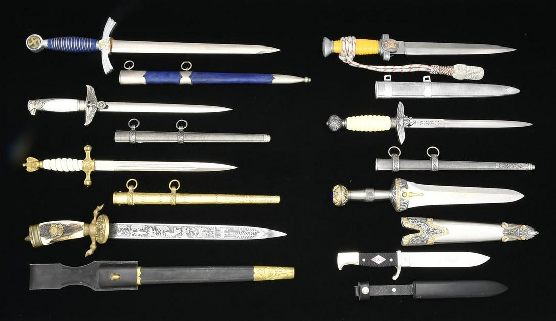7 REPRODUCTION WWII GERMAN DAGGERS & 1 COPY OF AN: ANCIENT EGYPTIAN DAGGER. 1) EGYPTIAN. Overall length: 15". Dagger is a modern copy of an ancient Egyptian form. (02-15206/BF). 2) HUNTING ASSOCIATION. Overall length: 18 1/2". A reproduction of a WWII
