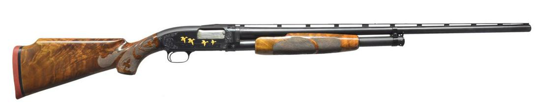 PAULINE MUERRLE ENGRAVED WINCHESTER MODEL 12: TRAP PUMP SHOTGUN. Cal. 12 Ga., 2 3/4". S# 1931506. Bbl. 30" w/ new style 3 pin factory VR & duck bill extension. Fixed Full choke. Steel mid bead, front bead is missing. Action has custom No. 5 engra