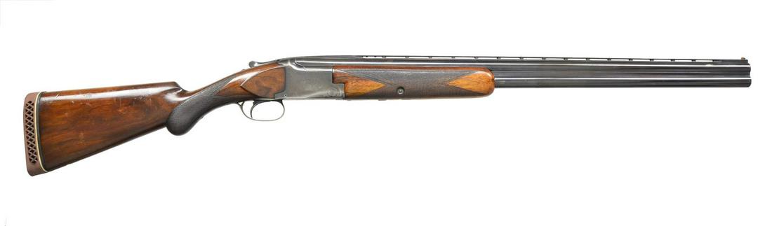 EARLY 1950'S BROWNING GRADE 1 SUPERPOSED O/U: SHOTGUN. Cal. 12 Ga. S# 21553 (1951). The 28" VR bbls. are marked w/ Browning's St. Louis address as well as patents, chamber information & "MADE IN BELGIUM" on top bbl. Left side of breech is marked 